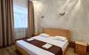 Номер 5-местный 2-комнатный (с двумя односпальными кроватями и диваном)