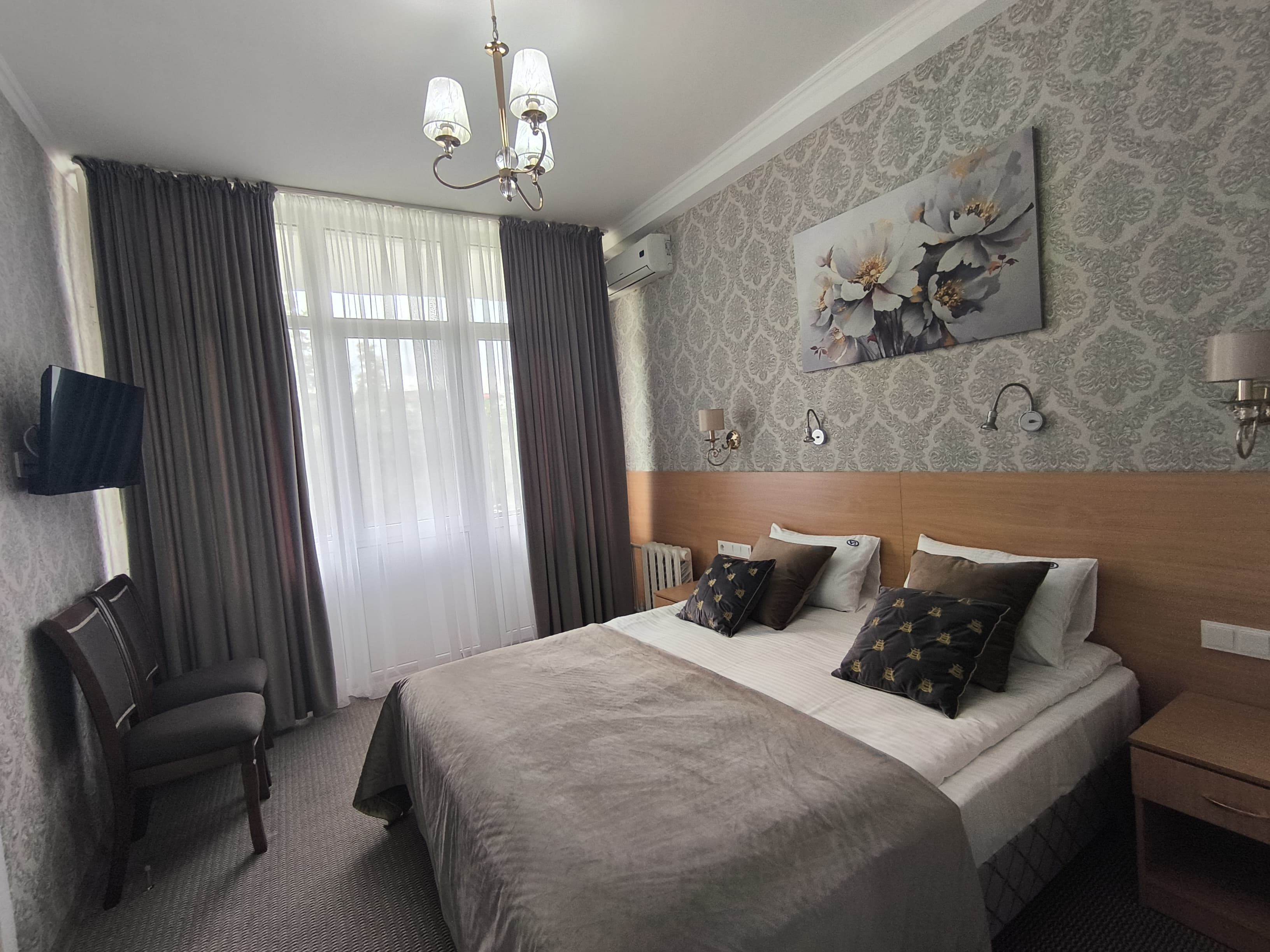 Фотография Люкс 2-местный 2-комнатный Люкс Комфорт корпус № 1 (Л2м2к1К)