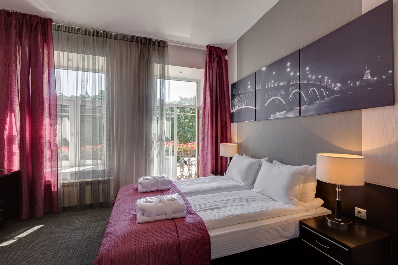 Фотография Улучшенный 3-местный с балконом