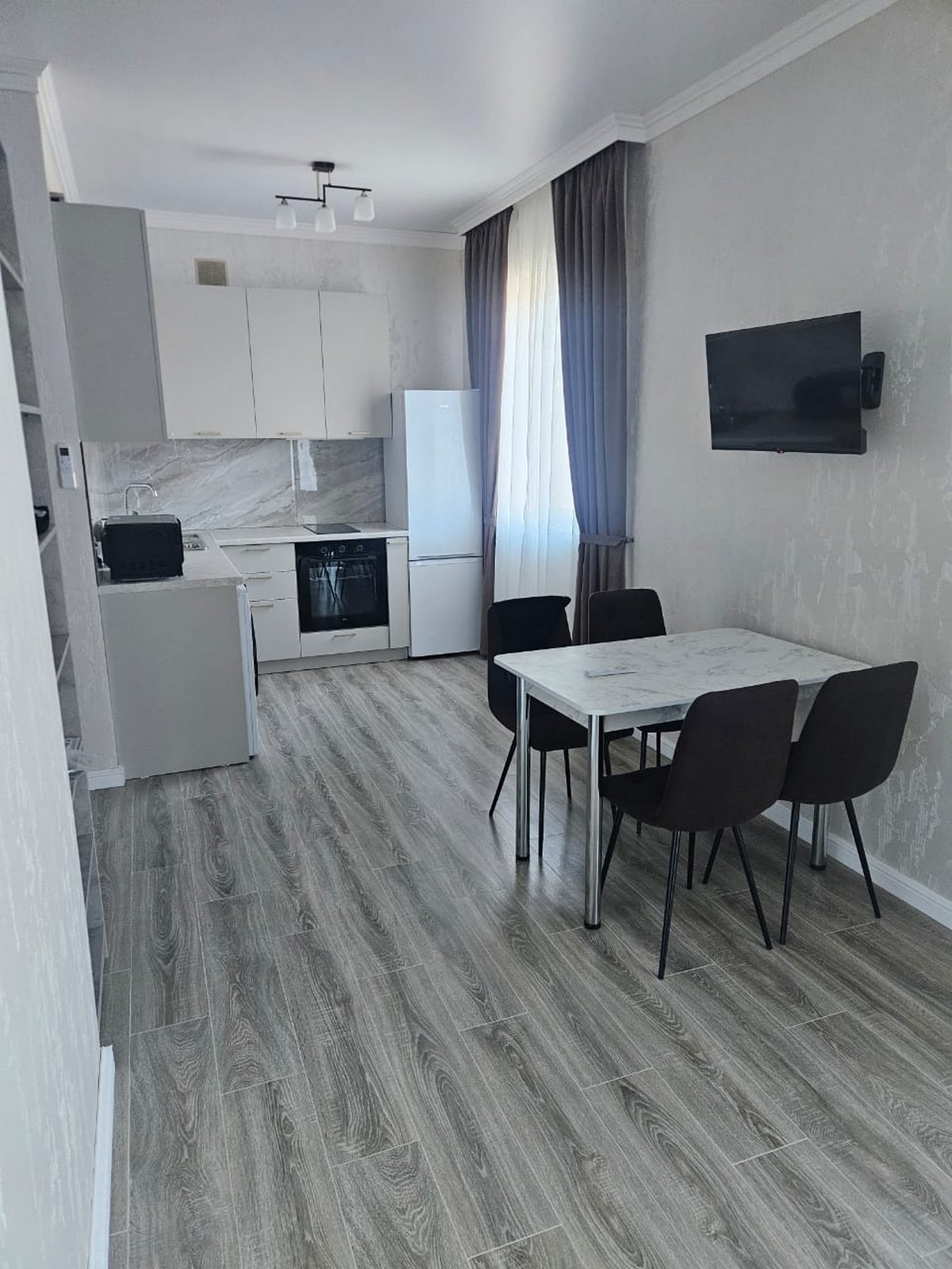 Апартаменты 4-местный 1-комнатный (с видом на город)